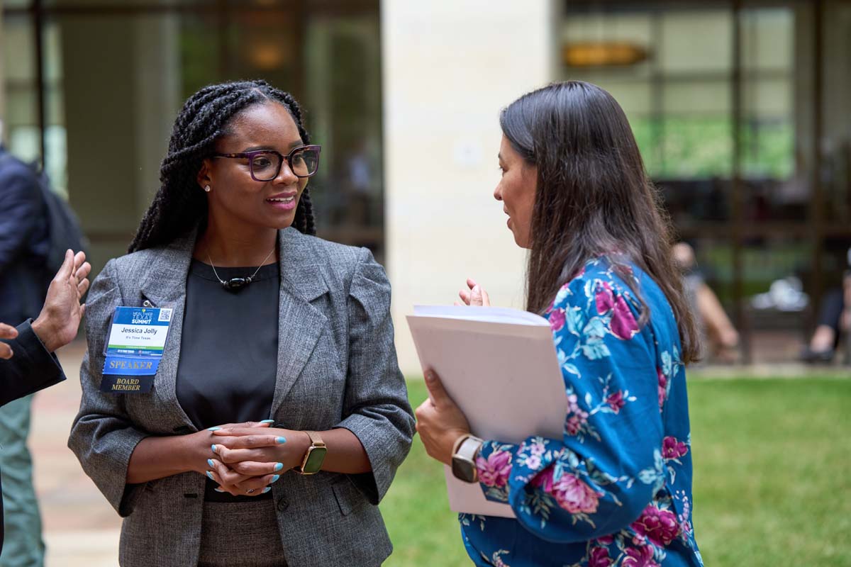 Two women having a conversation at the 2023 Healthier Texas Summit in Austin, Texas